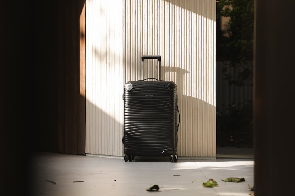 Black Travel Case Illuminated In the Center of the Picture