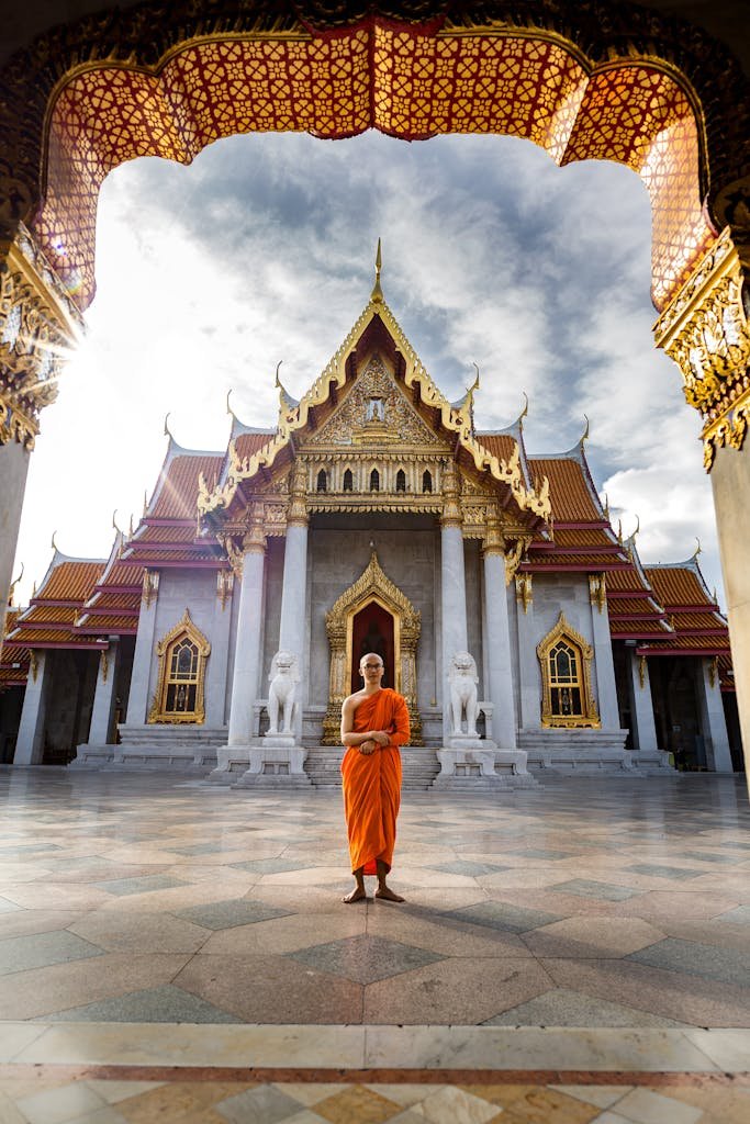 Man Standing Outside a Prayer Temple